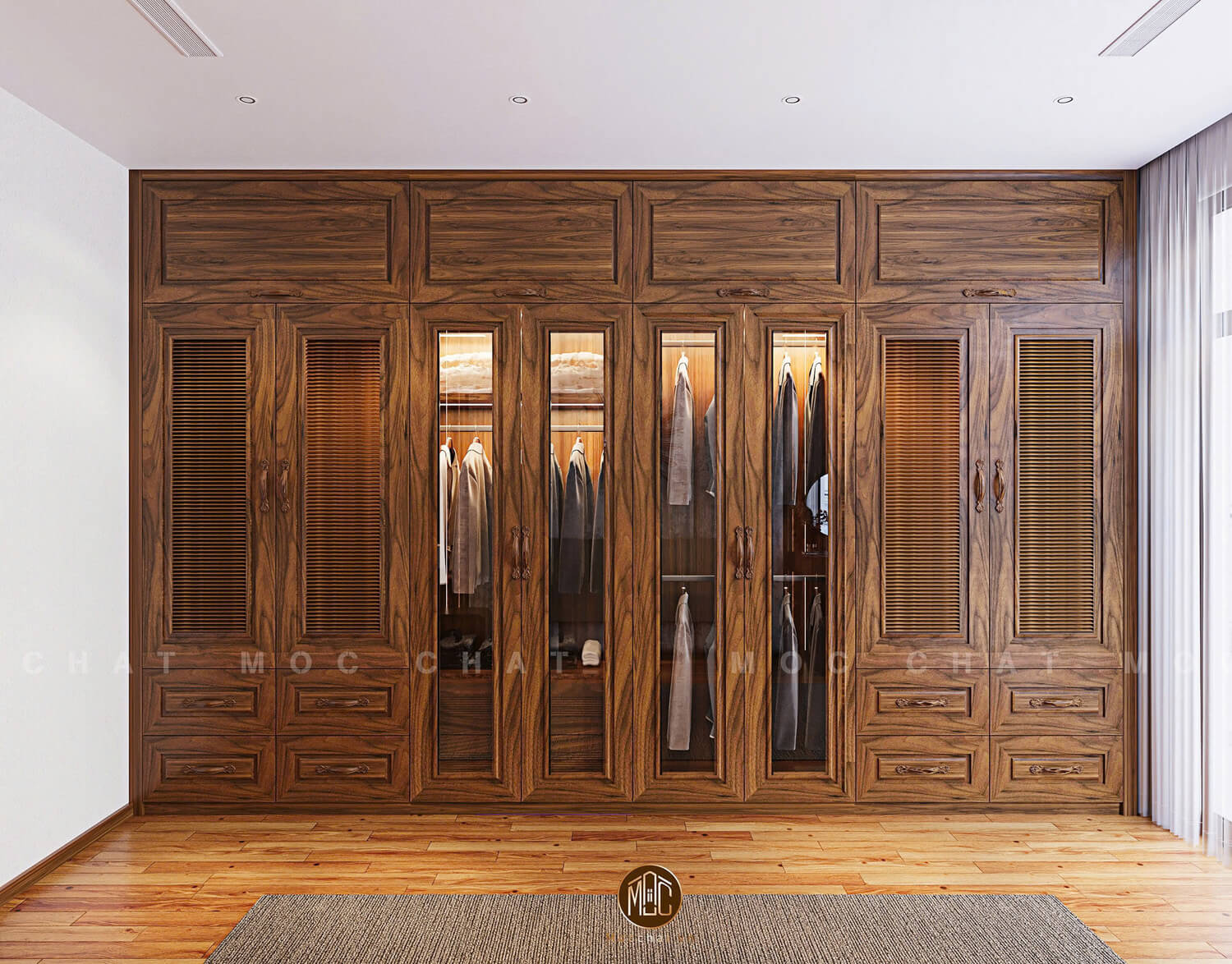 Tủ quần áo gỗ óc chó lớn, thiết kế cửa kính và ngăn kéo tiện dụng, tạo không gian lưu trữ sang trọng và hiện đại cho phòng ngủ