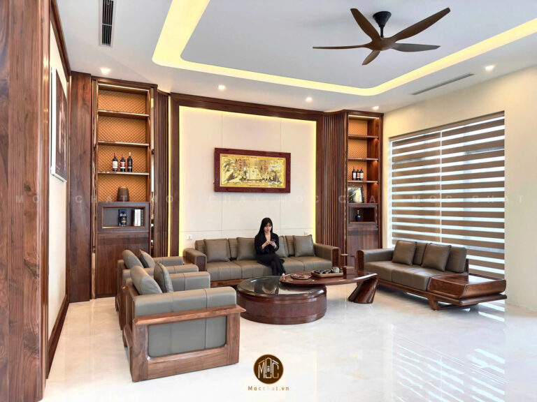 phong-khach-go-oc-cho-sang-trong-voi-sofa-cao-cap-va-he-vach-trang-tri-ket-hop-tu-ruou-tinh-te-k-villa-ninh-binh